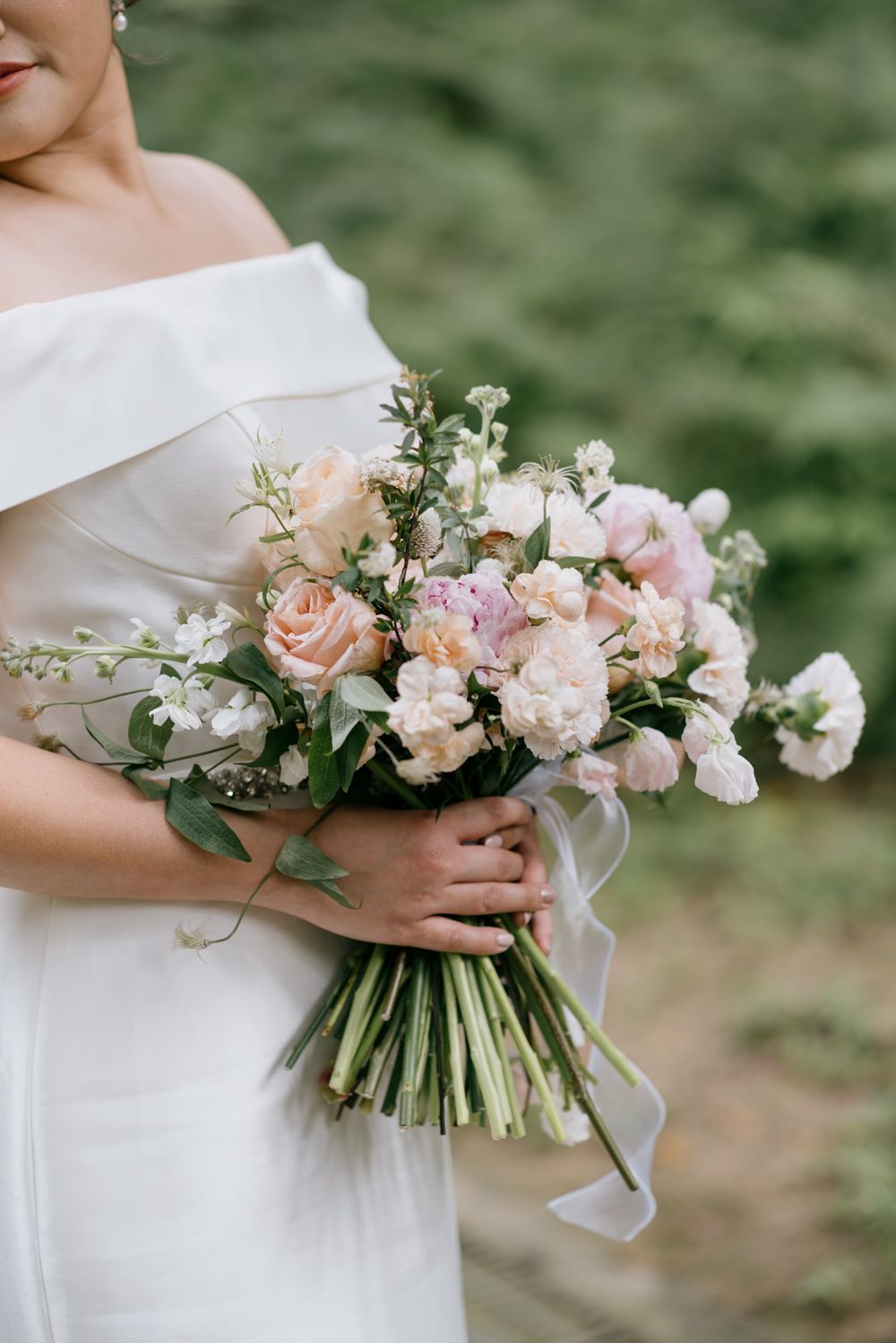 Bride with a blush bouquet